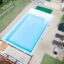 Les étapes à prévoir pour une pose de piscine adaptée à votre terrain